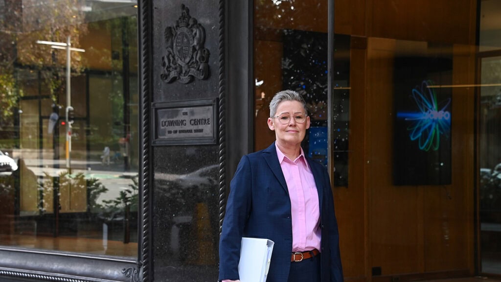 Criminal lawyer helping a client charged with a criminal offence NSW