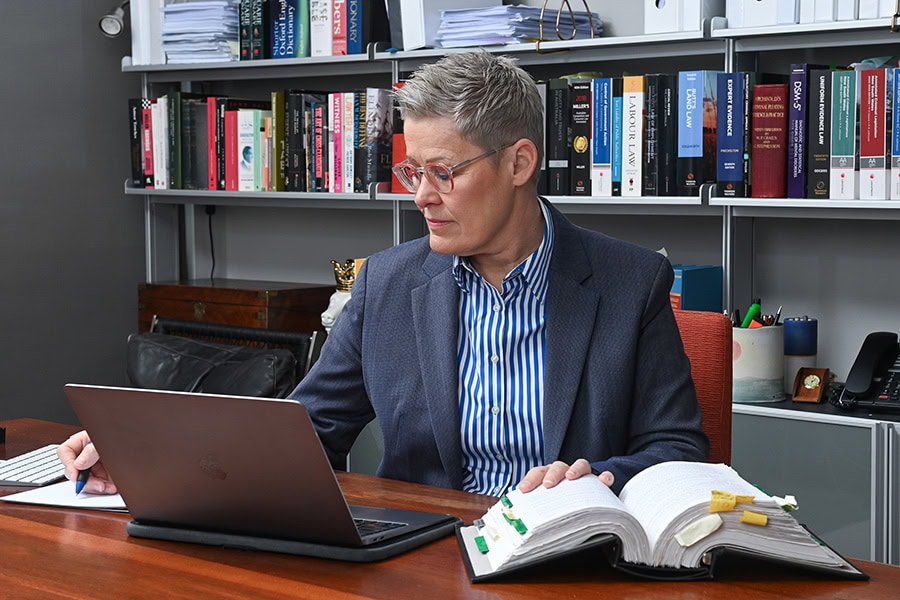 Traffic lawyer reviewing supporting evidence for a NSW licence suspension appeal